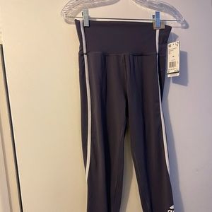 NEW WITH TAGS ADIDAS WOMENS TIGHTS WITH ADIDAS LOGO ON THE BACK OF BOTH LEGS
